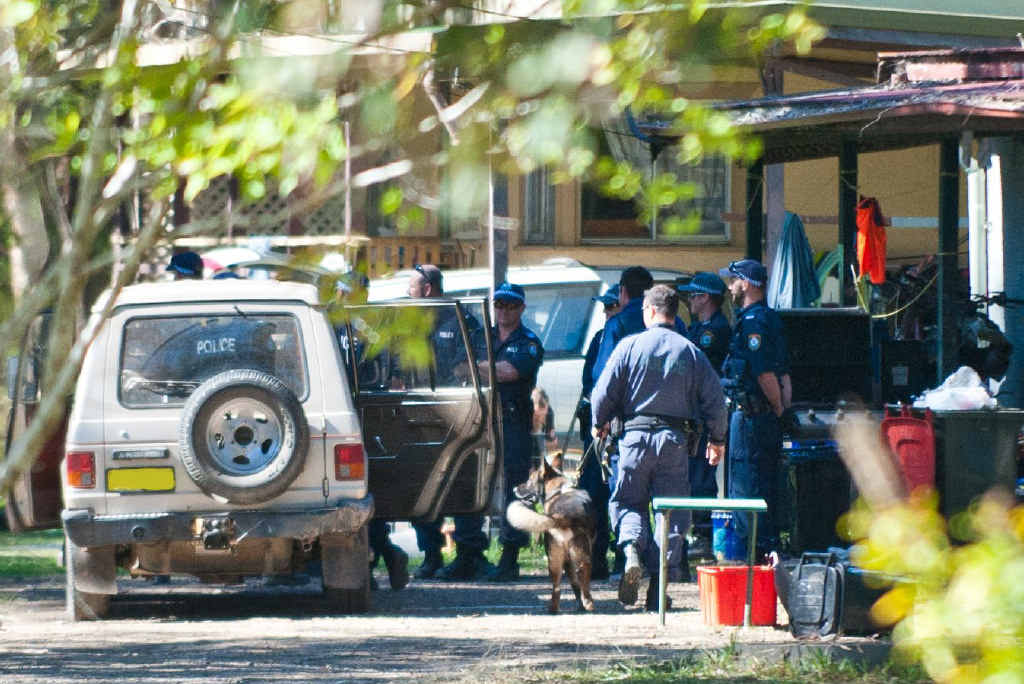 CRIME SCENE: Police searched for forensic evidence at Sandy Beach where a man was found unconscious on the road on Saturday night. CRIME SCENE: Police searched for forensic evidence at Sandy Beach where a man was found unconscious on the road on Saturday night.