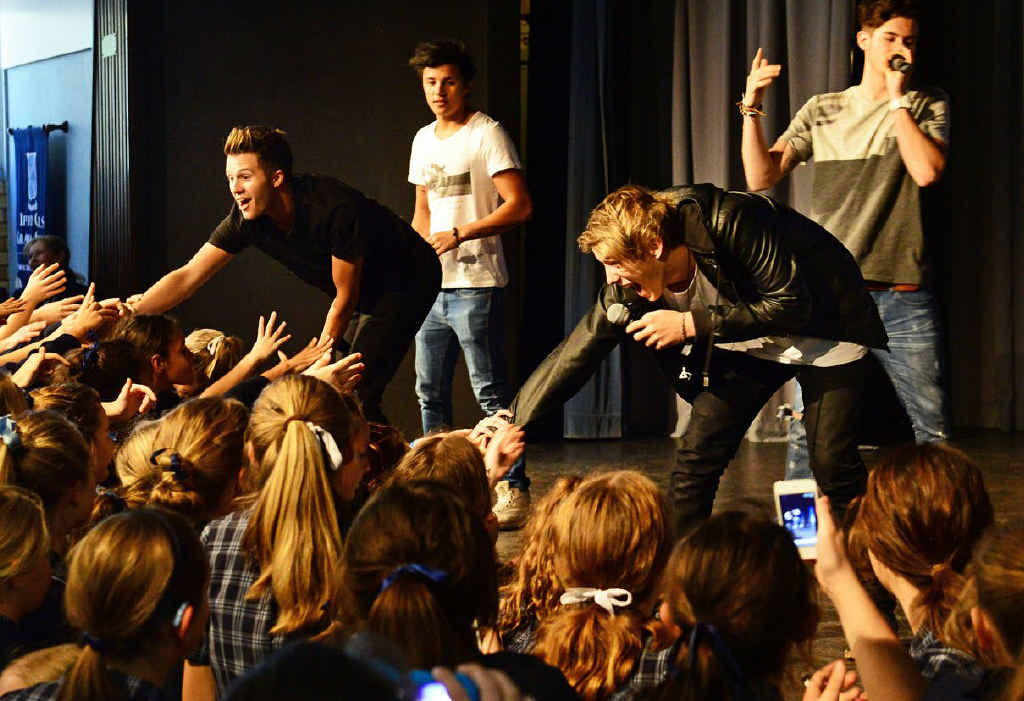 FRENZIED CRUSH: X Factor contestants What About Tonight performed for excited Ipswich Girls Grammar School students during lunch break yesterday. FRENZIED CRUSH: X Factor contestants What About Tonight performed for excited Ipswich Girls Grammar School students during lunch break yesterday.