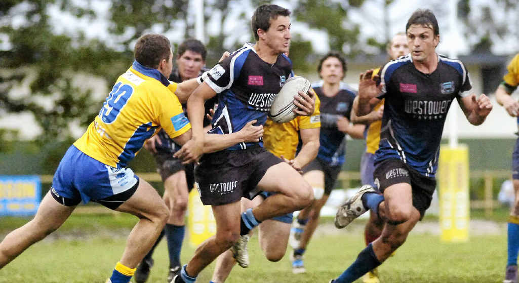 ON THE BURST: Troy Nichols (far right) watches teammate Mitch Knight plough through the SCU back line in the FNC Rugby Union clash. ON THE BURST: Troy Nichols (far right) watches teammate Mitch Knight plough through the SCU back line in the FNC Rugby Union clash.