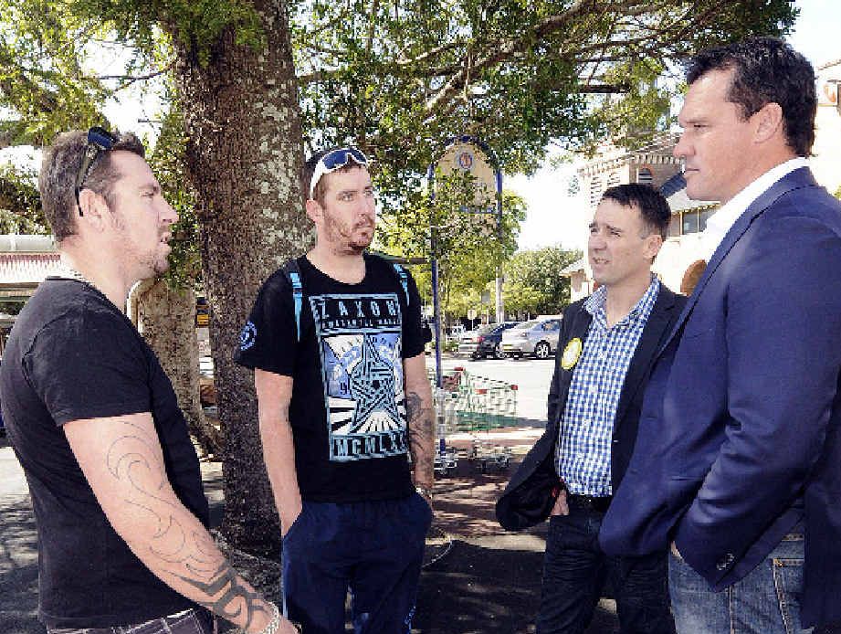 CAMPAIGN TRAIL: Tod and Ned Gray of Lismore speak with Palmer United Party candidate for Page Stephen Janes and NSW Senate lead candidate Matthew Adamson. CAMPAIGN TRAIL: Tod and Ned Gray of Lismore speak with Palmer United Party candidate for Page Stephen Janes and NSW Senate lead candidate Matthew Adamson.