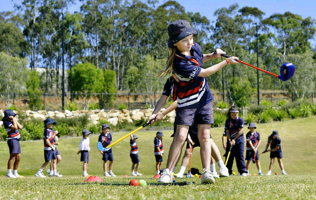 FUTURE STARS: Year four students from Springfield Anglican College learn about chipping and ripping in golf as part of the Queensland Open community activities this week. FUTURE STARS: Year four students from Springfield Anglican College learn about chipping and ripping in golf as part of the Queensland Open community activities this week.