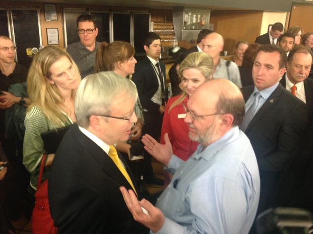 Kevin Rudd is bailed up after finishing the people's forum at Brisbane. Kevin Rudd is bailed up after finishing the people's forum at Brisbane.