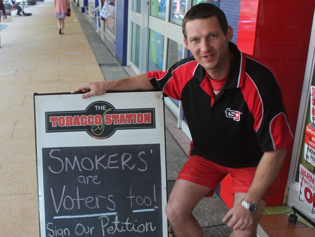 Assistant manager of The Tobacco Station in East St, Alan Cranston shows off the sign promoting his campaign to stop tax increases on tobacco products. Photo Chris Schwarten / Morning Bulletin Assistant manager of The Tobacco Station in East St, Alan Cranston shows off the sign promoting his campaign to stop tax increases on tobacco products. Photo Chris Schwarten / Morning Bulletin