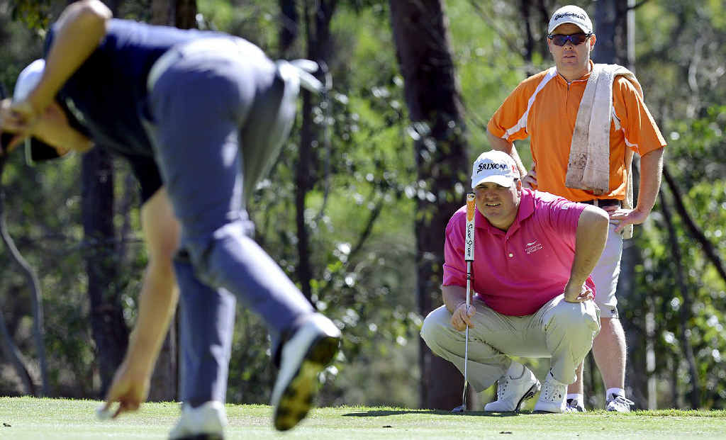 TOUGH GOING: Ipswich golfer Adam Gemmell lines up his shot at the second hole during the first round of the Queensland Open at Brookwater Golf and Country Club. Gemmell carded 10 over. TOUGH GOING: Ipswich golfer Adam Gemmell lines up his shot at the second hole during the first round of the Queensland Open at Brookwater Golf and Country Club. Gemmell carded 10 over.