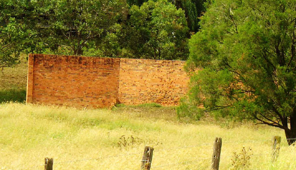 Former WWII Pistol Range Wall at Monash Rd, Redbank, that was destroyed by Main Roads. Former WWII Pistol Range Wall at Monash Rd, Redbank, that was destroyed by Main Roads.