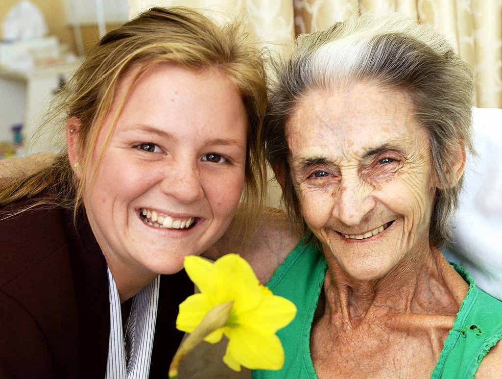 RAISING A SMILE: Ipswich State High School student Alexis List gives a daffodil to Theresa Turner in the Ipswich Hospital yesterday. RAISING A SMILE: Ipswich State High School student Alexis List gives a daffodil to Theresa Turner in the Ipswich Hospital yesterday.