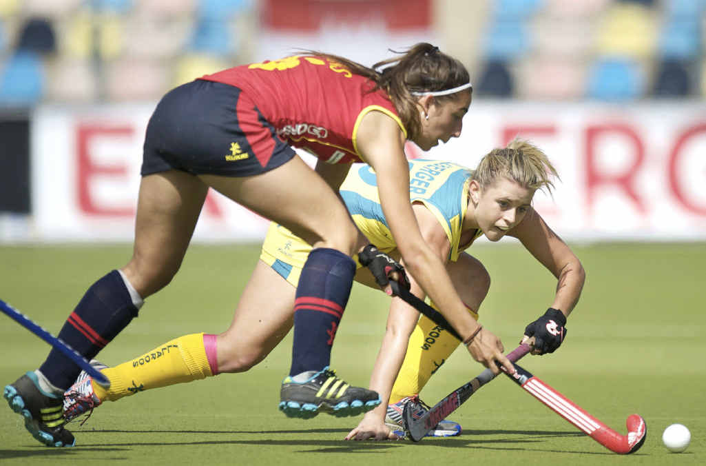 WORKING HARD: Ipswich and Australian under-21 player Jordyn Holzberger tries to contain a Spanish player during the recent Junior World Cup playoffs. WORKING HARD: Ipswich and Australian under-21 player Jordyn Holzberger tries to contain a Spanish player during the recent Junior World Cup playoffs.