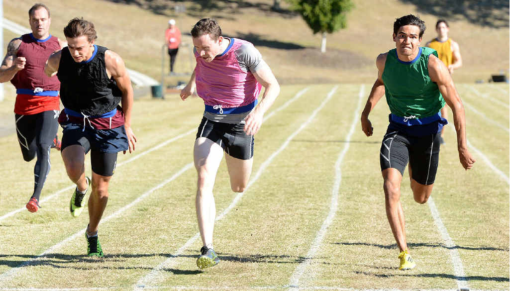 FINE FINISH: Ipswich club runner Scott Tuohy (pink vest) noses ahead of Conor Loughnan (left) and Joshua Robinson heading towards the 120m Ipswich Lightning Gift finish line at Bill Paterson Oval. FINE FINISH: Ipswich club runner Scott Tuohy (pink vest) noses ahead of Conor Loughnan (left) and Joshua Robinson heading towards the 120m Ipswich Lightning Gift finish line at Bill Paterson Oval.