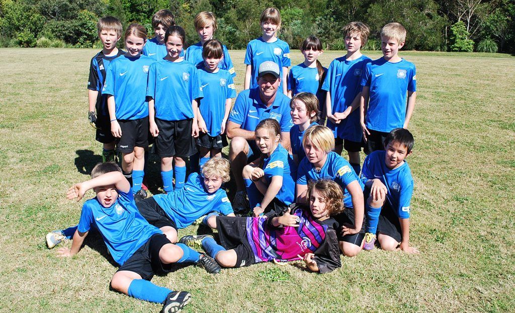 SPORT DAD: Paul Hanigan with some of the junior Bluedogs at the Bangalow field. SPORT DAD: Paul Hanigan with some of the junior Bluedogs at the Bangalow field.
