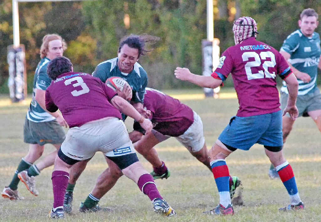 LEFT: Lismore City powerhouse Eddie Solomona finds his path blocked by Casino Bulls during their FNC Rugby Union clash. LEFT: Lismore City powerhouse Eddie Solomona finds his path blocked by Casino Bulls during their FNC Rugby Union clash.