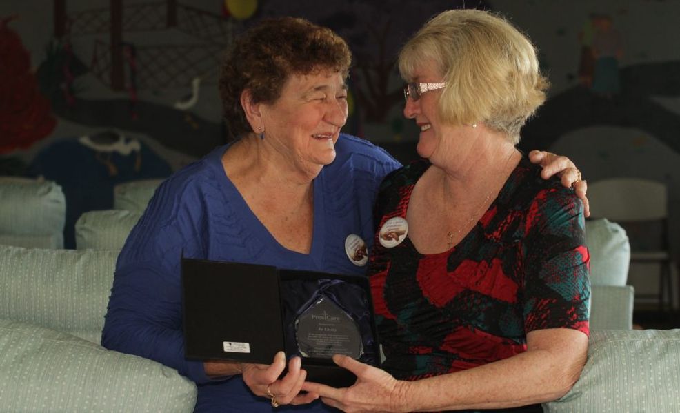 In Unity representatives Pat McKenzie and Neridah Ford are all smiles after receiving an award for volunteering at Granville's Groundwater Lodge. In Unity representatives Pat McKenzie and Neridah Ford are all smiles after receiving an award for volunteering at Granville's Groundwater Lodge.