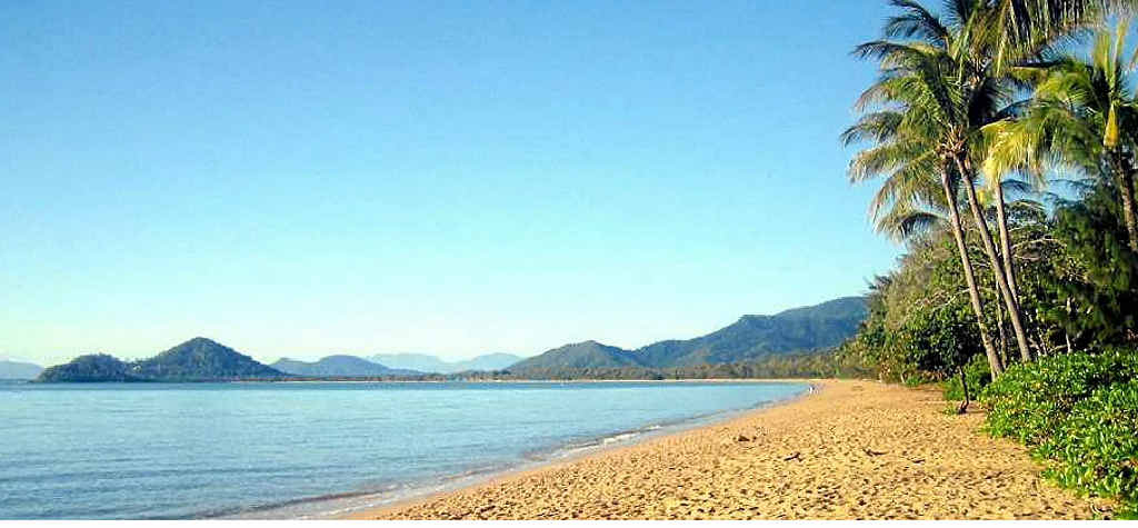 Palm-fringed, white sandy beach and the Coral Sea are right across the road from the Reef House Boutique Resort and Spa in Palm Cove. Palm-fringed, white sandy beach and the Coral Sea are right across the road from the Reef House Boutique Resort and Spa in Palm Cove.