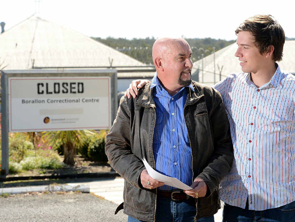 REUSE FACILITY: Former employee of the mothballed Borallon Correctional Centre, Hans Andersen, at the front of the centre with son William, has a proposal to turn the site into a community centre. REUSE FACILITY: Former employee of the mothballed Borallon Correctional Centre, Hans Andersen, at the front of the centre with son William, has a proposal to turn the site into a community centre.