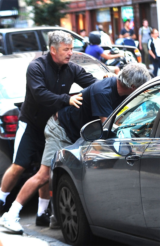 Alec Baldwin grabbing a photographer in New York City. Alec Baldwin grabbing a photographer in New York City.