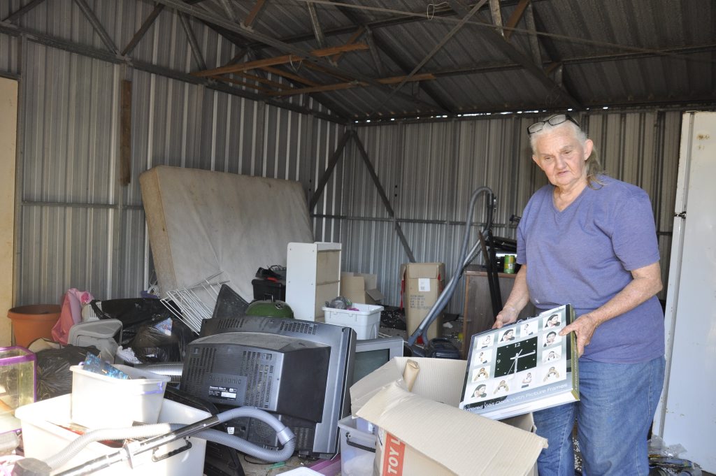 Landlord Von Souvlis cleans up some of the mess left in a shed by a tenant in her Drayton rental property. Landlord Von Souvlis cleans up some of the mess left in a shed by a tenant in her Drayton rental property.