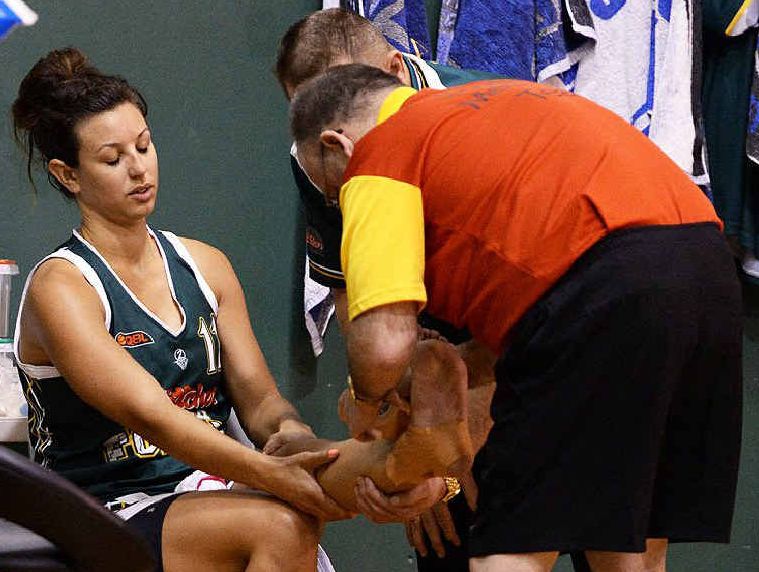 QUICK PATCH-UP: Ipswich Force forward Emma Langford receives treatment after injuring her left ankle in last weekend’s state league quarter-final at Booval. QUICK PATCH-UP: Ipswich Force forward Emma Langford receives treatment after injuring her left ankle in last weekend’s state league quarter-final at Booval.