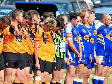 Avondale and Agnes Water line up for the national anthem before the start of the Northern Districts grand final at Gin Gin Sports Ground last Sunday. Avondale and Agnes Water line up for the national anthem before the start of the Northern Districts grand final at Gin Gin Sports Ground last Sunday.