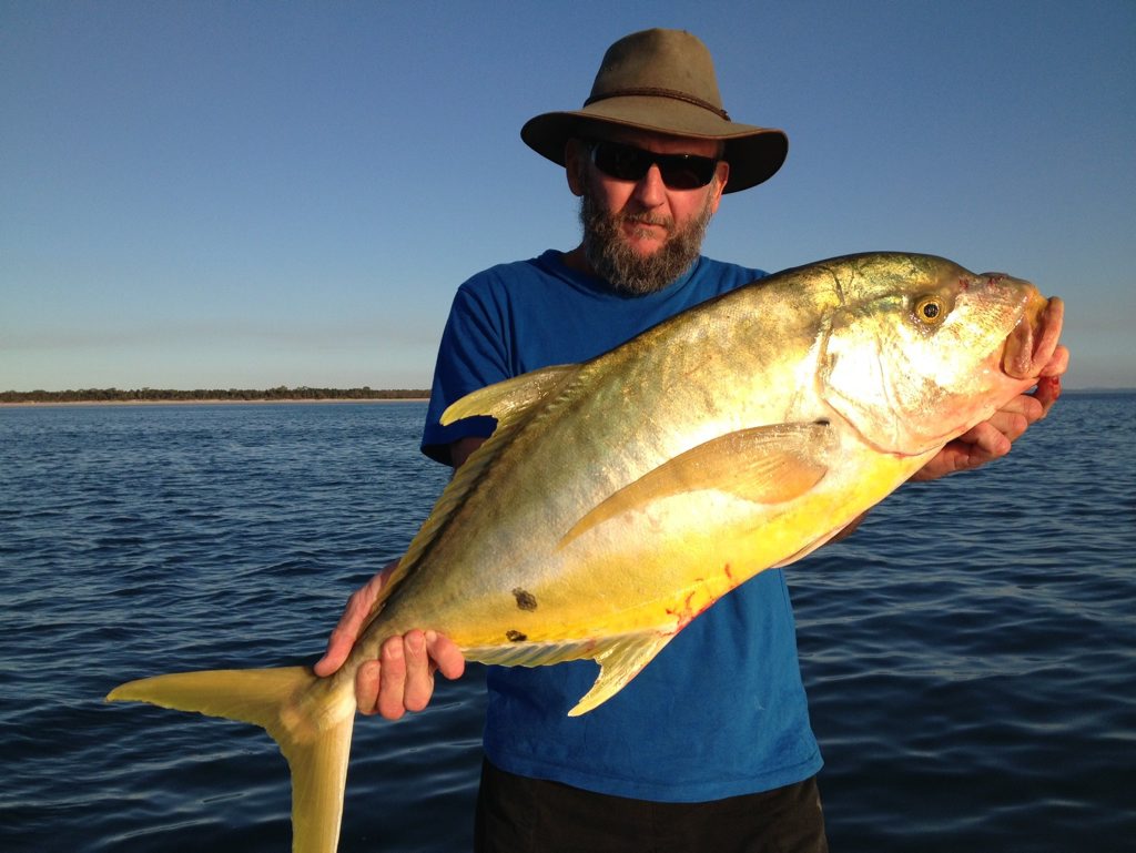 Wondunna local Mark Simpson with a solid golden trevally caught recently. Wondunna local Mark Simpson with a solid golden trevally caught recently.