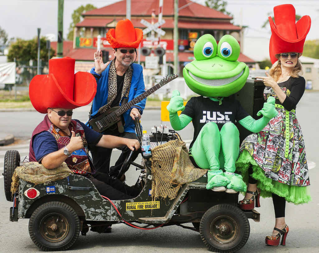 MOVING ALONG: The Memphis Moovers with a frog at the Rosewood Festival street parade on Saturday. MOVING ALONG: The Memphis Moovers with a frog at the Rosewood Festival street parade on Saturday.