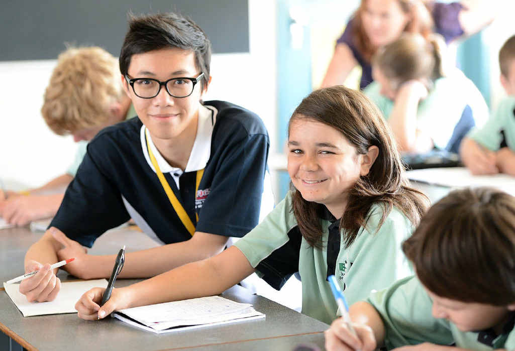 GUIDING LIGHT: UQ tutor Oscar Ho helps out Year 9 Bundamba State Secondary College student Jerome Robinson. GUIDING LIGHT: UQ tutor Oscar Ho helps out Year 9 Bundamba State Secondary College student Jerome Robinson.