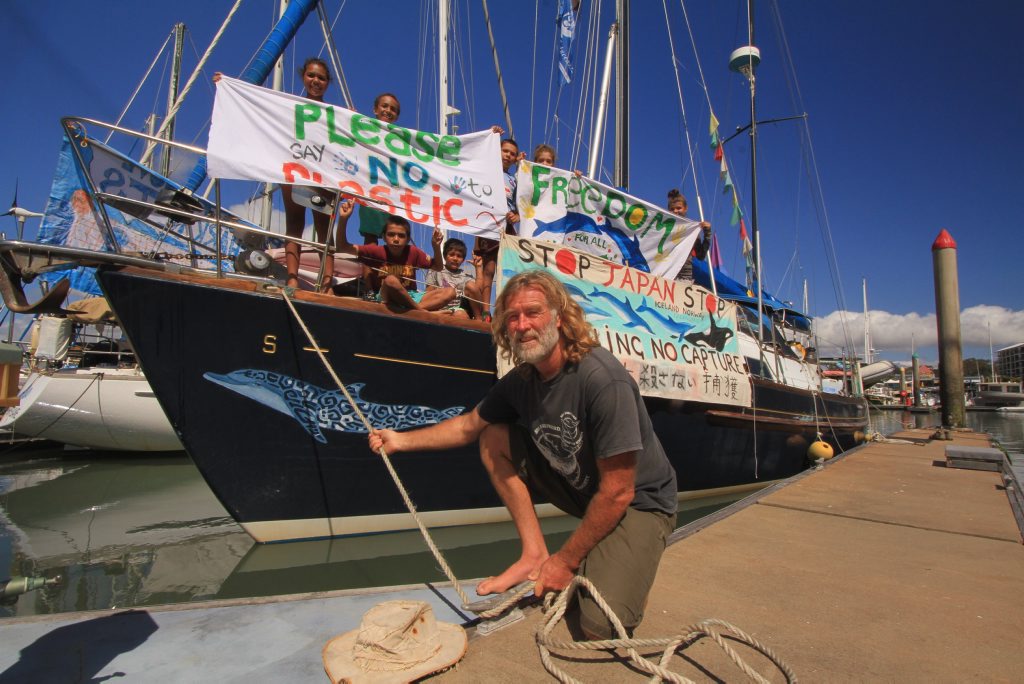 Image for sale: Skipper of Migaloo 2 Dean Jeffreys, with a crew of Kgariwakkabirri dancers at Urangan marina, protest whale and dolphin killing.