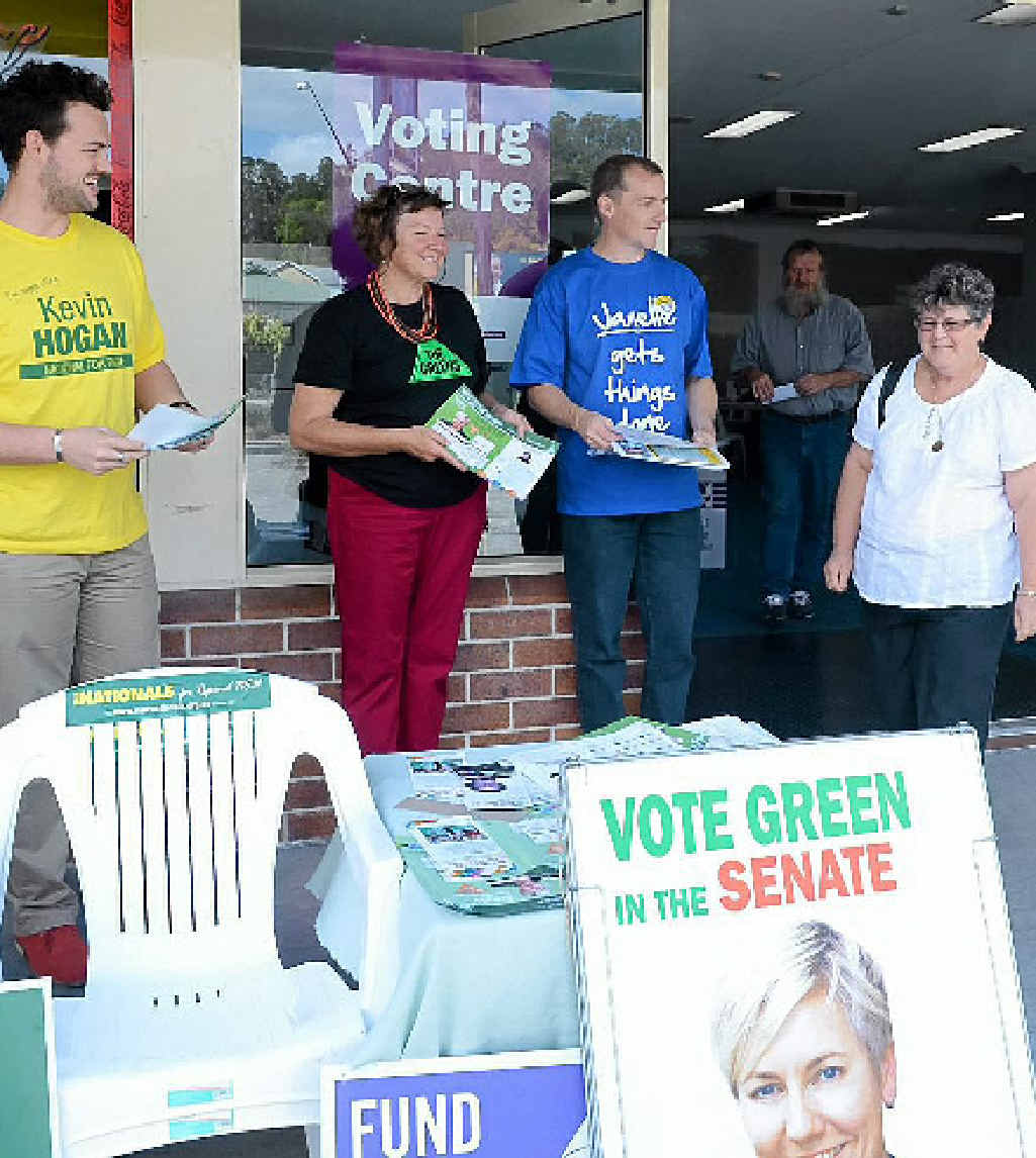 THAT’S DONE: Patricia Morgan of Casino leaves the pre-poll centre in Lismore after voting. Isaac Jeffrey, Desley Banks and Isaac Smith hand out how to vote cards. THAT’S DONE: Patricia Morgan of Casino leaves the pre-poll centre in Lismore after voting. Isaac Jeffrey, Desley Banks and Isaac Smith hand out how to vote cards.
