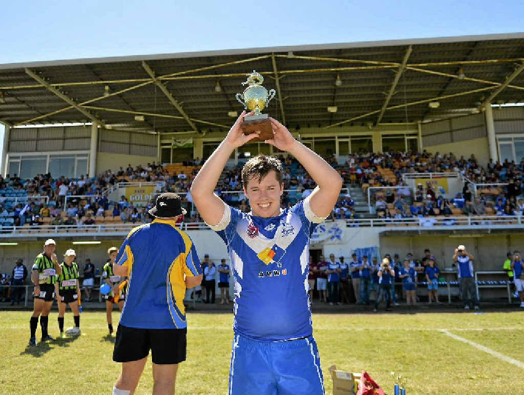 Valleys’ under-18 captain Jack Wilson lifts the trophy after his side was successful over Brothers in the grand final. Valleys’ under-18 captain Jack Wilson lifts the trophy after his side was successful over Brothers in the grand final.