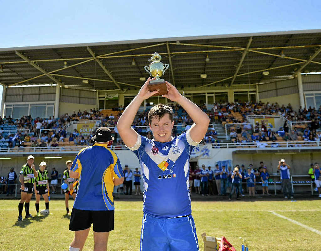 Valleys’ under-18 captain Jack Wilson lifts the trophy after his side was successful over Brothers in the grand final. Valleys’ under-18 captain Jack Wilson lifts the trophy after his side was successful over Brothers in the grand final.