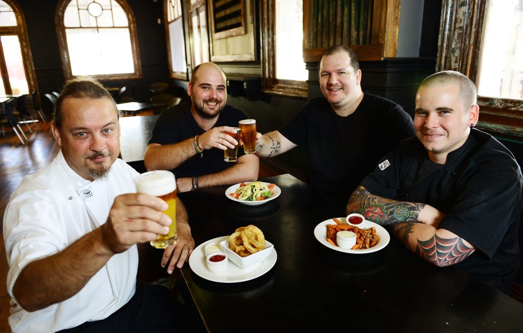 NEW FLAVOUR: (left to right) Hotel Metropole chef Bernard Green, owners Mitch Spurrier and Jason Trembath and chef Michael Barton take time out for a relaxing drink before the hotel’s newly renovated Waghorn bar beer garden and diner officially opens for business. NEW FLAVOUR: (left to right) Hotel Metropole chef Bernard Green, owners Mitch Spurrier and Jason Trembath and chef Michael Barton take time out for a relaxing drink before the hotel’s newly renovated Waghorn bar beer garden and diner officially opens for business.