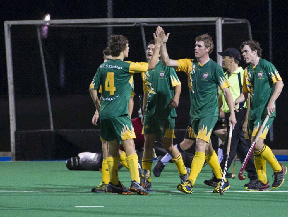 HIGH FIVE: Justin Alford congratulates Mark Pollock after he scored the winning goal in extra time.