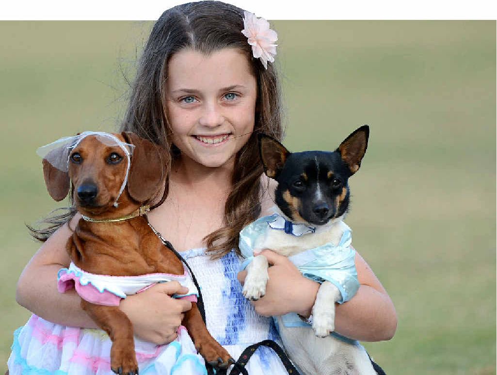 GOOD FUN: Mother of the bride Lara Urwin with Bella and Archie, who were married in a special doggy ceremony last weekend. GOOD FUN: Mother of the bride Lara Urwin with Bella and Archie, who were married in a special doggy ceremony last weekend.
