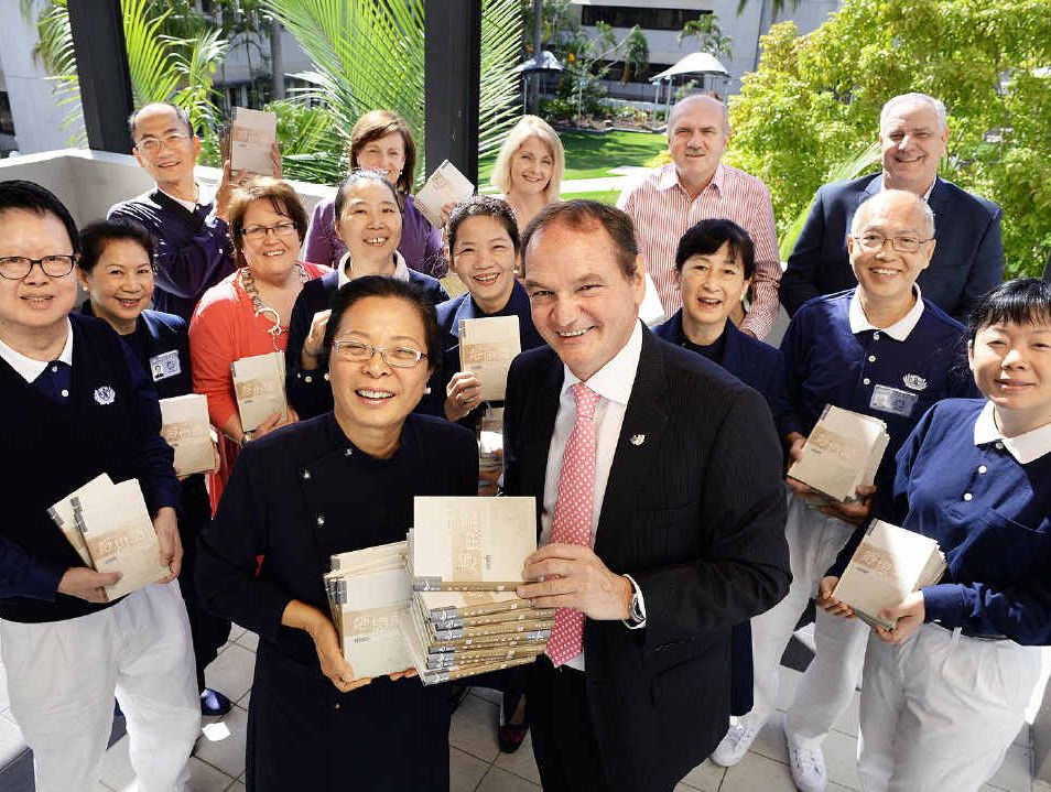 HELPING HANDS: Julia Wu (front), the principal of Tzu Chi Foundation Australia based at the Gold Coast, and other members of the Buddhist Compassion Relief Tzu Chi Foundation donate books to the Metro Hotel International and library services in Ipswich. HELPING HANDS: Julia Wu (front), the principal of Tzu Chi Foundation Australia based at the Gold Coast, and other members of the Buddhist Compassion Relief Tzu Chi Foundation donate books to the Metro Hotel International and library services in Ipswich.