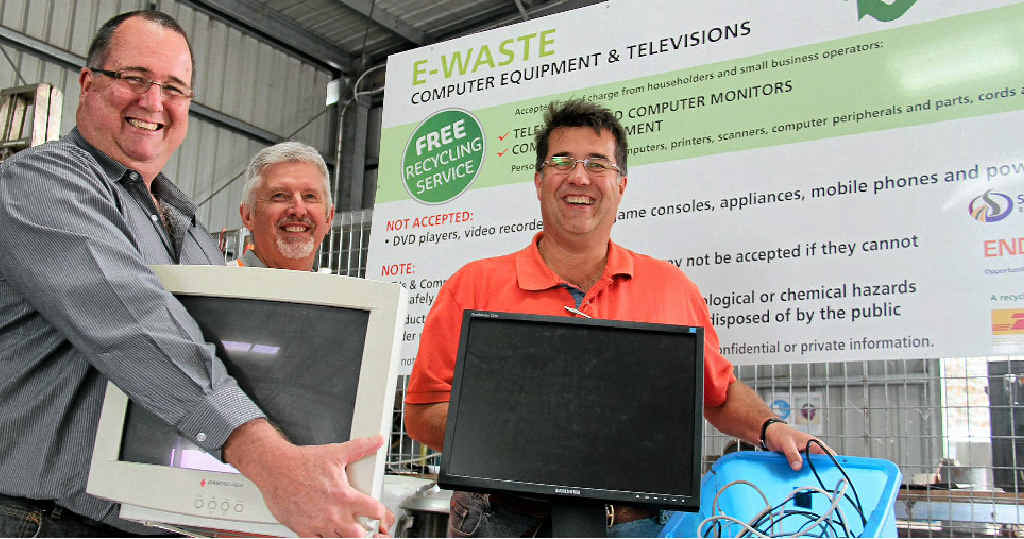 NO WASTE: Southern Downs Mayor Peter Blundell, senior environmental officer Don Atkinson and councillor Neil Meiklejohn offload some old monitors to the new e-dump site at the Warwick Central Waste Facility.