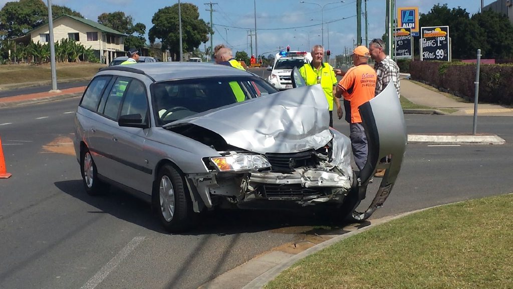 The front end of a station wagon has crumpled in a two-vehicle crash on Main St near Bunnings. The front end of a station wagon has crumpled in a two-vehicle crash on Main St near Bunnings.
