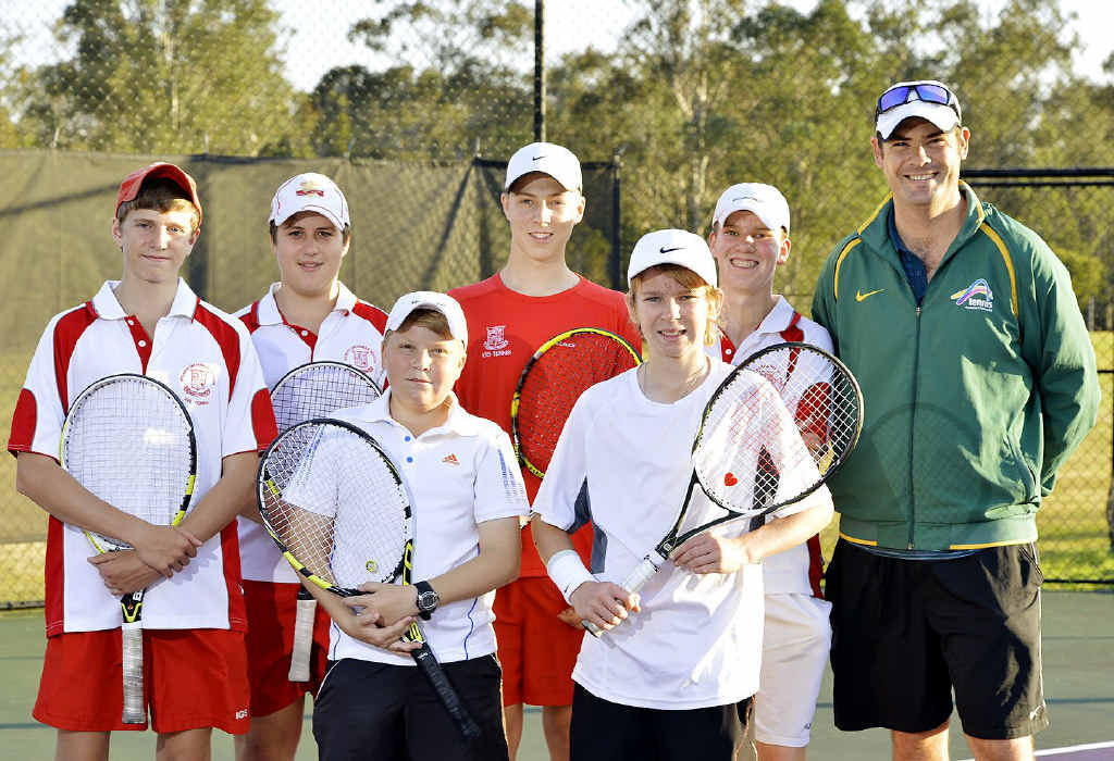 ACE LINE-UP: Tennis Australia coach Scott Rawlins encourages Ipswich Perrett Shield players at the recent training day at Brassall. ACE LINE-UP: Tennis Australia coach Scott Rawlins encourages Ipswich Perrett Shield players at the recent training day at Brassall.