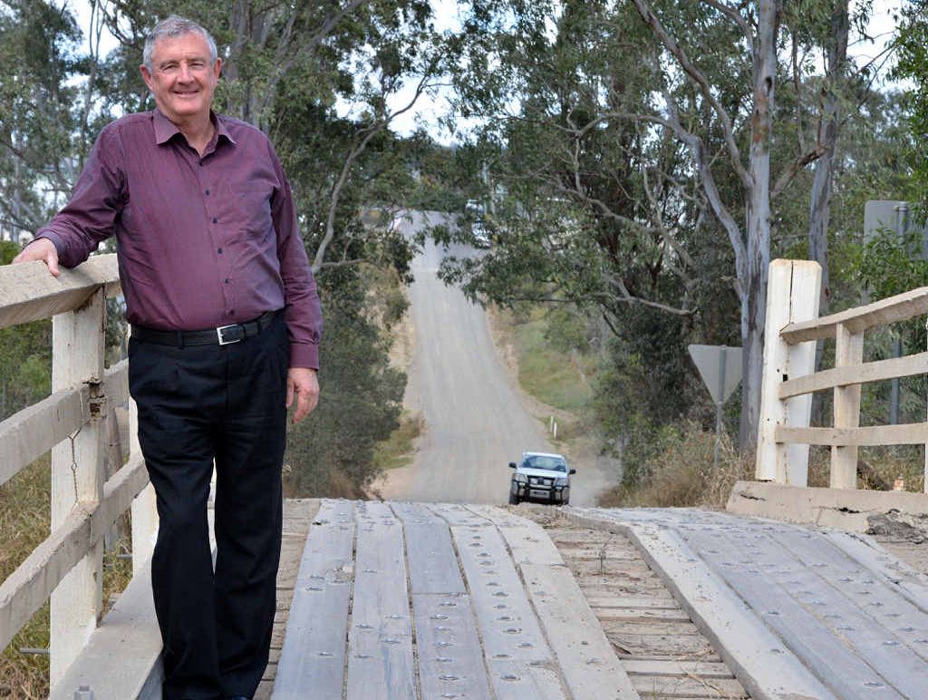 Gympie Mayor Ron Dyne at the bridge on Drummond Dr that will be upgraded to all-weather access through the $4.4 million flood mitigation project. Gympie Mayor Ron Dyne at the bridge on Drummond Dr that will be upgraded to all-weather access through the $4.4 million flood mitigation project.