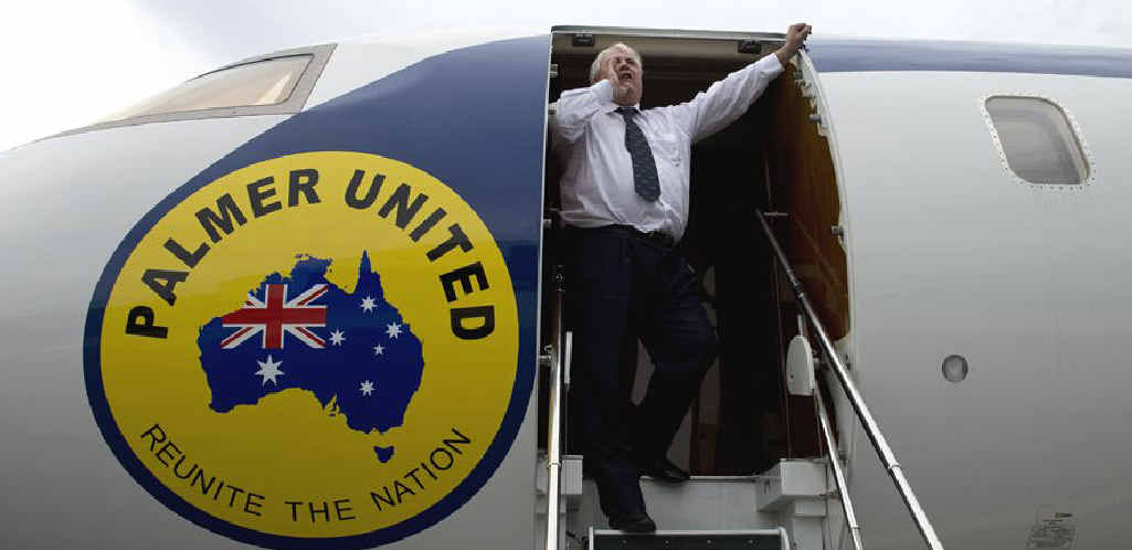 Clive Palmer yells in frustration from his aircraft toward Prime Minister Kevin Rudd’s personnel in a nearby hangar after his plane was refused refuelling at Melbourne Airport. Clive Palmer yells in frustration from his aircraft toward Prime Minister Kevin Rudd’s personnel in a nearby hangar after his plane was refused refuelling at Melbourne Airport.