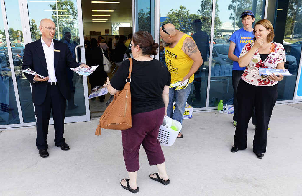 Shayne Neumann (left) and Teresa Harding (right) at the pre-polling booth at Riverlink yesterday. Shayne Neumann (left) and Teresa Harding (right) at the pre-polling booth at Riverlink yesterday.