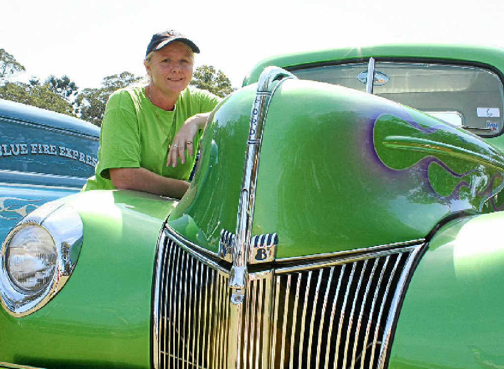 GREEN MACHINE: Trojans Rod and Custom Club secretary Dr Toni Pacey with her 1940 Ford Pick-up. GREEN MACHINE: Trojans Rod and Custom Club secretary Dr Toni Pacey with her 1940 Ford Pick-up.