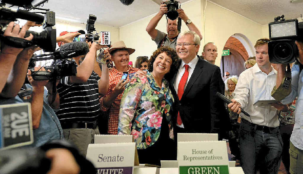 HAPPIER TIME: Prime Minister Kevin Rudd and his wife Therese Rein cast their vote at a voting centre at St Paul’s Anglican church in Brisbane yesterday. HAPPIER TIME: Prime Minister Kevin Rudd and his wife Therese Rein cast their vote at a voting centre at St Paul’s Anglican church in Brisbane yesterday.