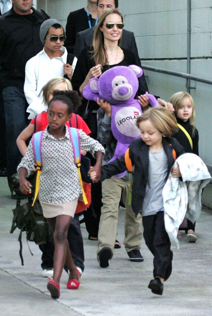 Actress Angelina Jolie arrives at Sydney Airport with her children, Friday, September 6, 2013. (Rear L-R) Maddox, Angelina Jolie and Vivienne. (Front L-R) Zahara and Knox. (AAP Image/Mick Tsikas) Actress Angelina Jolie arrives at Sydney Airport with her children, Friday, September 6, 2013. (Rear L-R) Maddox, Angelina Jolie and Vivienne. (Front L-R) Zahara and Knox. (AAP Image/Mick Tsikas)