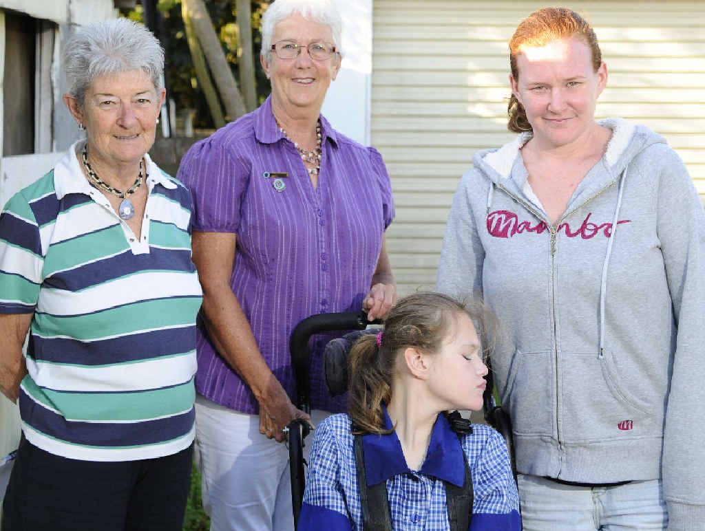 HELPING HAND: CWA North Coast Group treasurer Margaret Annand, CWA North Coast Group secretary Anna Bransdon, Kiara-Ann Brugnatti and Helen Brugnatti, the mother of Kiara-Ann who suffers from microcephaly. HELPING HAND: CWA North Coast Group treasurer Margaret Annand, CWA North Coast Group secretary Anna Bransdon, Kiara-Ann Brugnatti and Helen Brugnatti, the mother of Kiara-Ann who suffers from microcephaly.