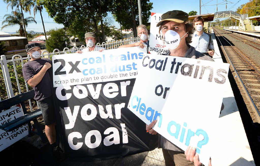 DUST UP: Spokesman for Stop Brisbane Coal Trains John Gordon with fellow members at the East Ipswich train station. DUST UP: Spokesman for Stop Brisbane Coal Trains John Gordon with fellow members at the East Ipswich train station.