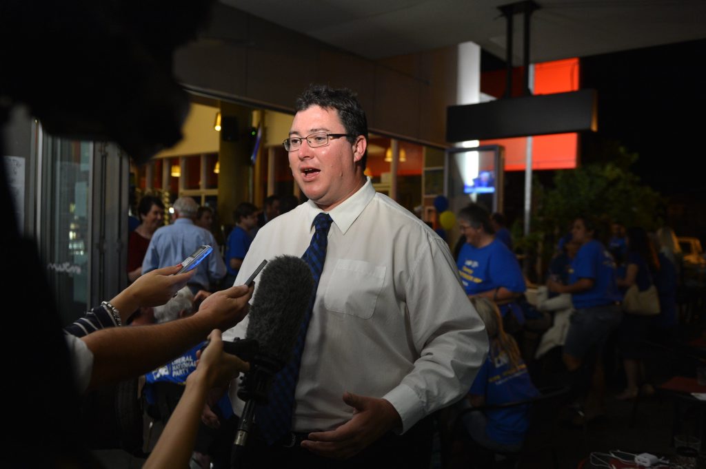 LNP Member for Dawson George Christensen speaks to the media as his supporters celebrate his win in the Federal Election. LNP Member for Dawson George Christensen speaks to the media as his supporters celebrate his win in the Federal Election.