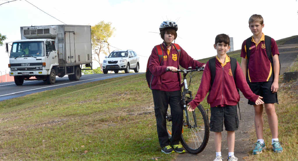 SAFETY CALL: Monkland State Primary School students Joshua McLaughlin, Jack Marshall and Thomas Fea show the end of the walking path before their school and beside a busy Brisbane Rd. Students have petitioned council to complete the walk and riding pathway to make it safer for all members in the community. SAFETY CALL: Monkland State Primary School students Joshua McLaughlin, Jack Marshall and Thomas Fea show the end of the walking path before their school and beside a busy Brisbane Rd. Students have petitioned council to complete the walk and riding pathway to make it safer for all members in the community.