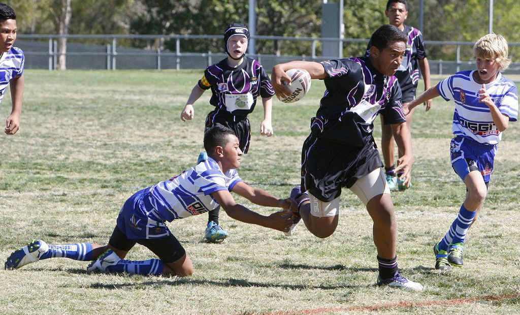 FOOTY FINALS: A Springfield Black player makes a strong run against Brothers during a recent under-12a final at the Briggs Road Sporting Complex. Keep reading your QT for a preview of this weekend’s Ipswich Junior Rugby League grand finals. FOOTY FINALS: A Springfield Black player makes a strong run against Brothers during a recent under-12a final at the Briggs Road Sporting Complex. Keep reading your QT for a preview of this weekend’s Ipswich Junior Rugby League grand finals.
