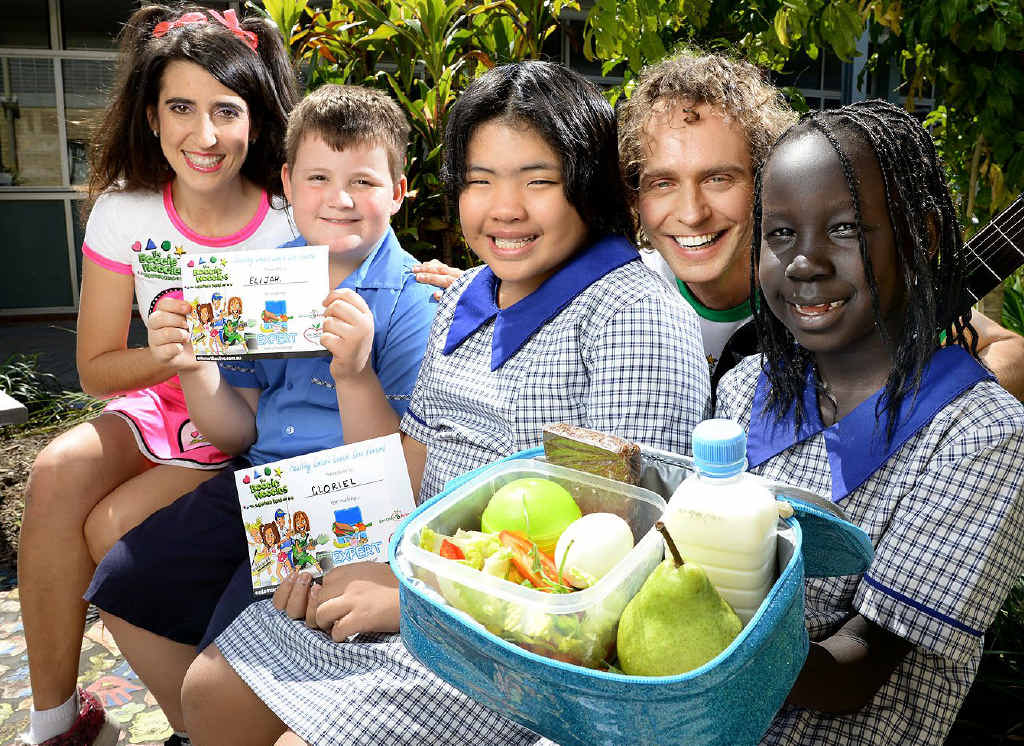 HEALTHY CHOICE: Students Elijah Clarke, Gloriel Santos and Adior Majak from St Francis Xavier Primary School in Goodna received a healthy smart lunch box award from Selina Box and David McCallum from The Boogie Woogies. HEALTHY CHOICE: Students Elijah Clarke, Gloriel Santos and Adior Majak from St Francis Xavier Primary School in Goodna received a healthy smart lunch box award from Selina Box and David McCallum from The Boogie Woogies.
