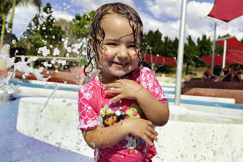 SUMMER FUN: Peyton Hoffmans, 3, beats the heat at Ipswich’s River Heart water park yesterday. SUMMER FUN: Peyton Hoffmans, 3, beats the heat at Ipswich’s River Heart water park yesterday.