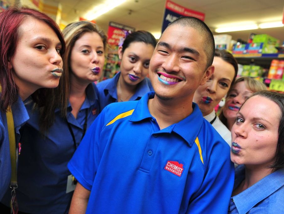 Shane Pablo and his Chemist Warehouse colleagues are participating in Liptember, which involves wearing bright lipstick during September to raise awareness of women's mental health. 