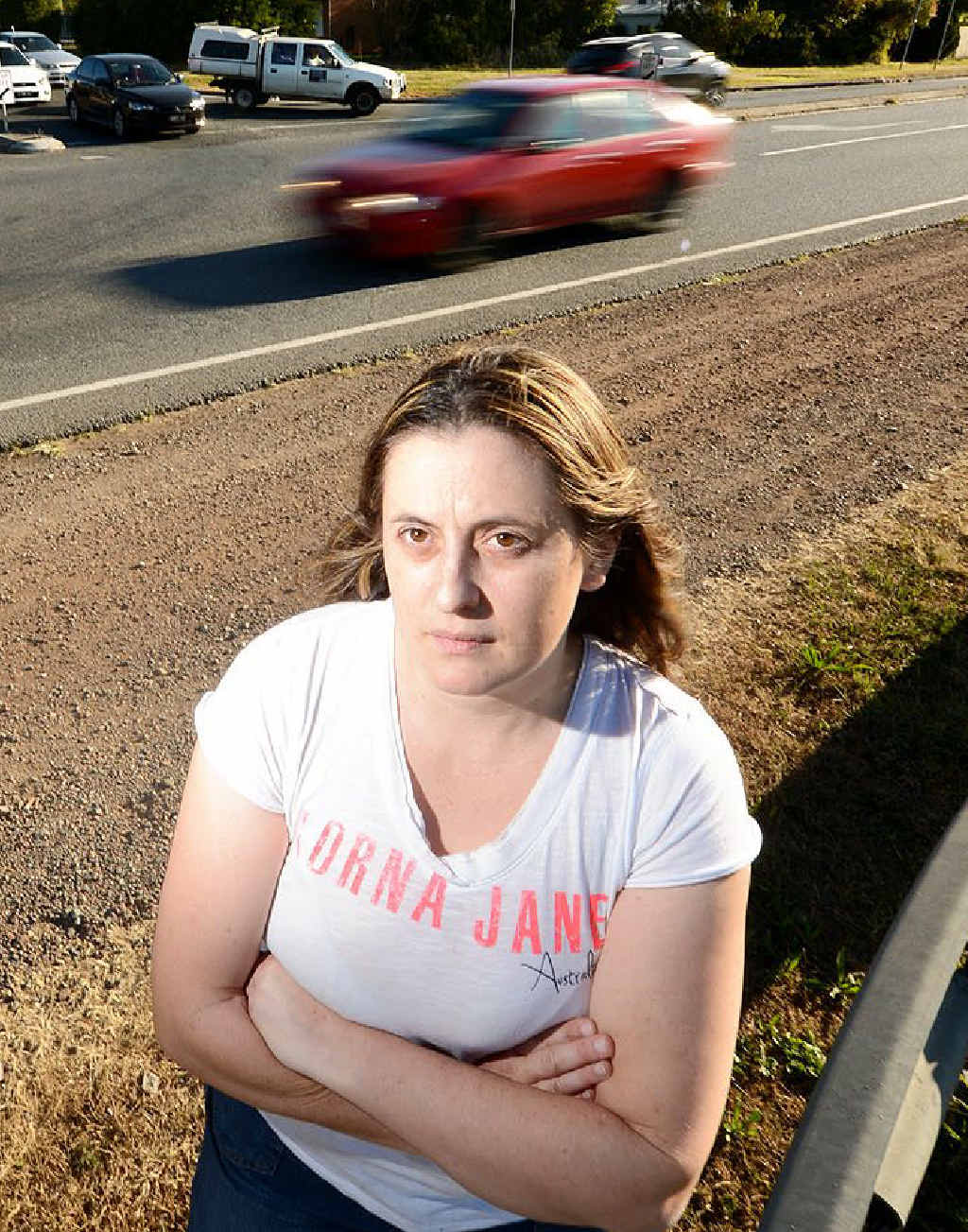 FED UP: Karen MacPherson wants lights at Redbank Plains and Cedar Rd. FED UP: Karen MacPherson wants lights at Redbank Plains and Cedar Rd.